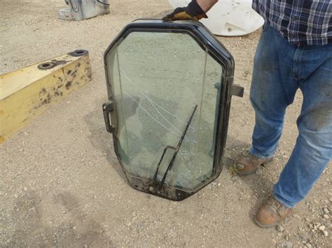 john deere skid steer window replacement|caterpillar 262b front door window.